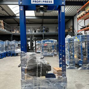 Industrial 100-ton workshop press with fixed head and 2000mm extended daylight, ideal for pressing and straightening heavy, long objects.