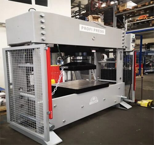 300-ton hydraulic press with light curtain photo cells and mesh side curtains for enhanced operator safety.
