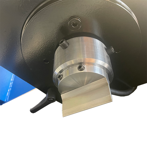 Close-up of a piston end cap with adapter slot for press brake tools.